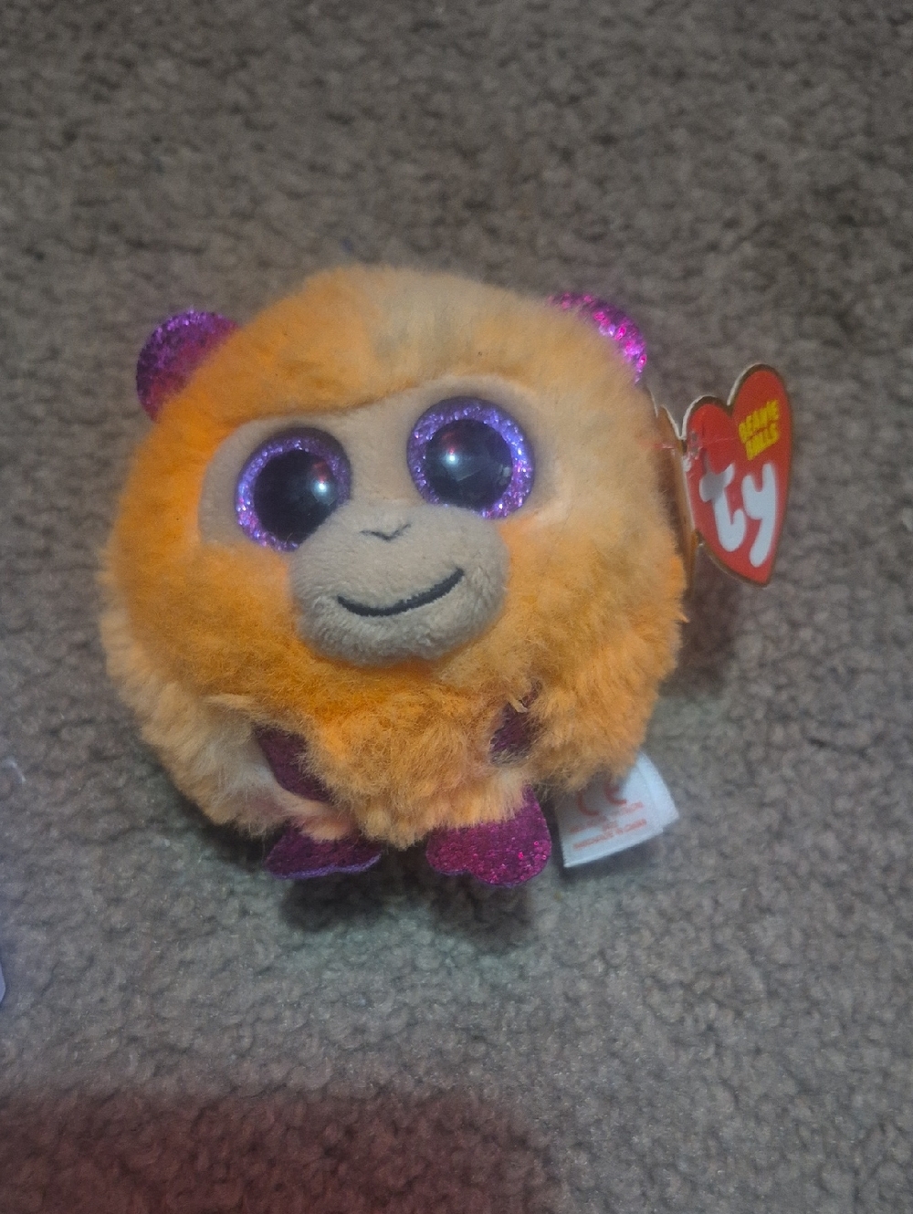 Ty Orange Plush with Sparkly Purple Eyes and Glitter Accents